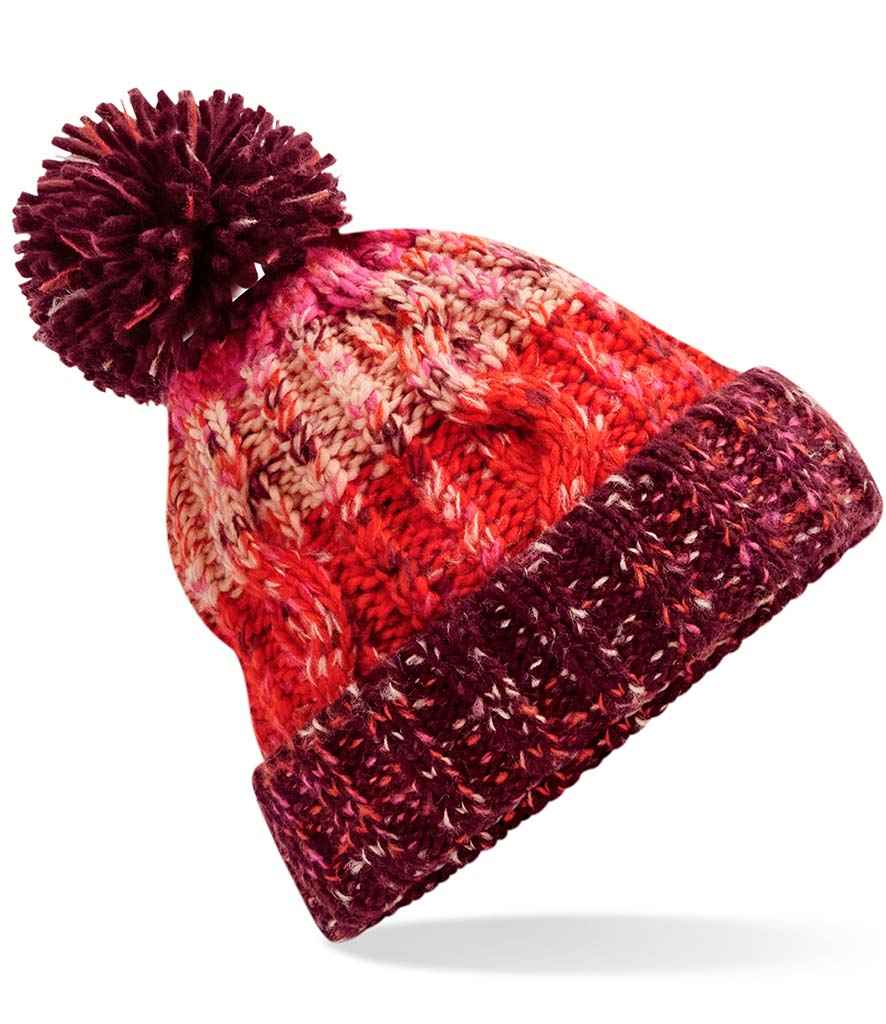 Beechfield Corkscrew Pom Pom Beanie in ONE Cherry Sherbet by Beechfield — Custom branded clothing by Print Press, featuring premium embroidery produced in our specialist print lab in the UK.