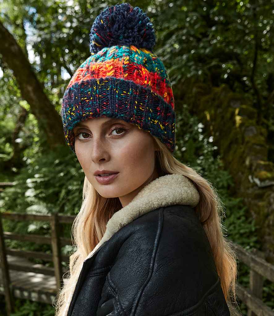 Beechfield Corkscrew Pom Pom Beanie in ONE Crackling Campfire by Beechfield — Custom branded clothing by Print Press, featuring premium embroidery produced in our specialist print lab in the UK.