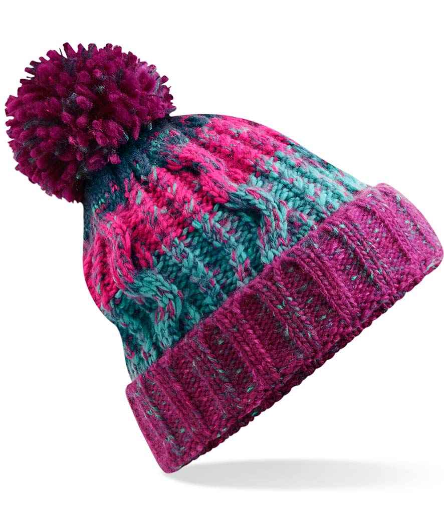 Beechfield Corkscrew Pom Pom Beanie in ONE Winter Berries by Beechfield — Custom branded clothing by Print Press, featuring premium embroidery produced in our specialist print lab in the UK.