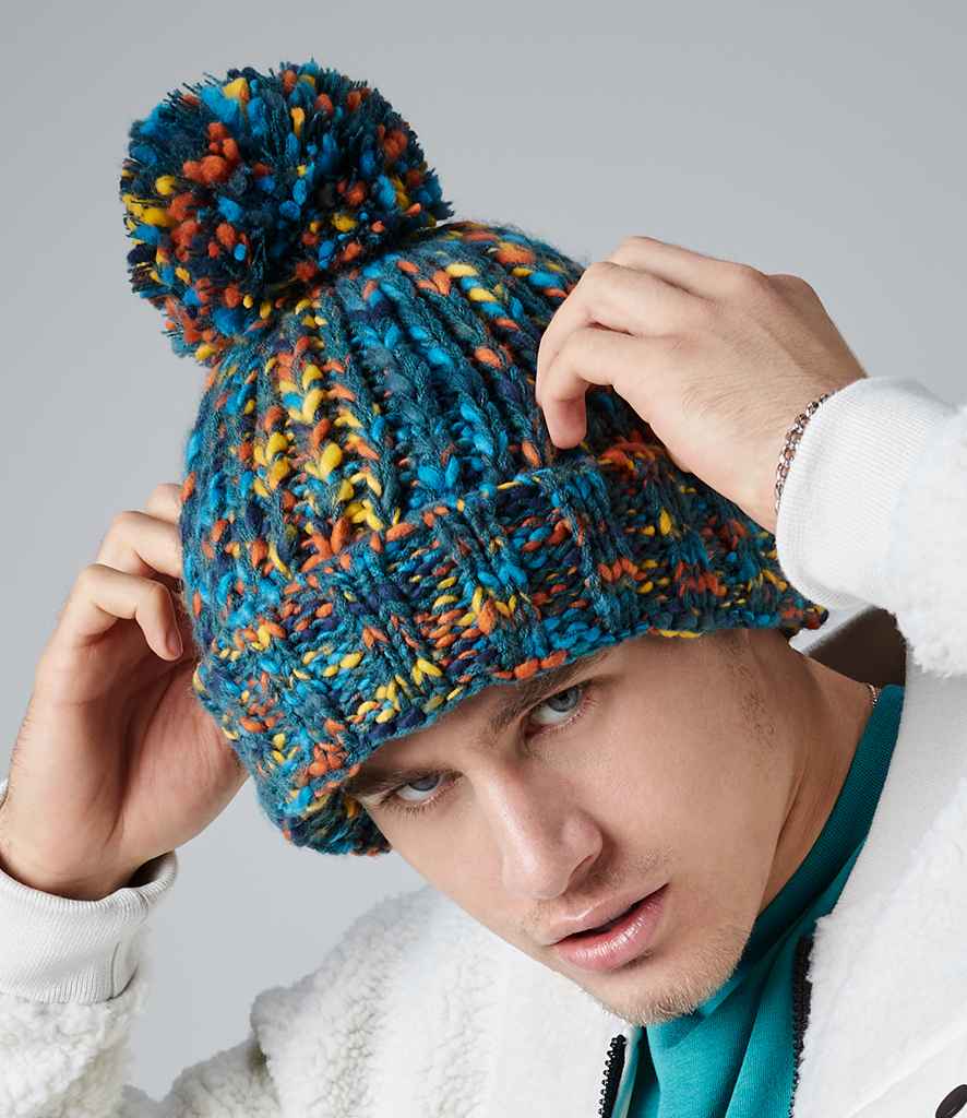 Beechfield Twister Pom Pom Beanie in ONE Retro Twist by Beechfield — Custom branded clothing by Print Press, featuring premium embroidery produced in our specialist print lab in the UK.