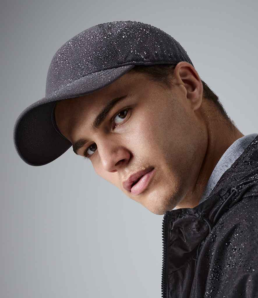 Beechfield Seamless Waterproof Cap in ONE Graphite Grey by Beechfield — Custom branded clothing by Print Press, featuring premium embroidery produced in our specialist print lab in the UK.