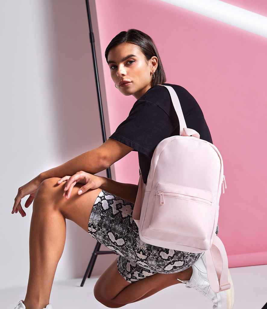 BagBase Mini Essential Fashion Backpack in ONE Powder Pink by Bagbase — Custom branded clothing by Print Press, featuring premium embroidery produced in our specialist print lab in the UK.