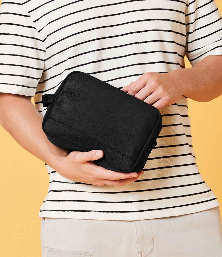 BagBase Recycled Essentials Wash Bag in ONE Black by Bagbase — Custom branded clothing by Print Press, featuring premium embroidery produced in our specialist print lab in the UK.
