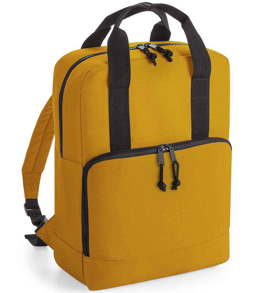 BagBase Recycled Cooler Backpack in ONE Mustard by Bagbase — Custom branded clothing by Print Press, featuring premium embroidery produced in our specialist print lab in the UK.