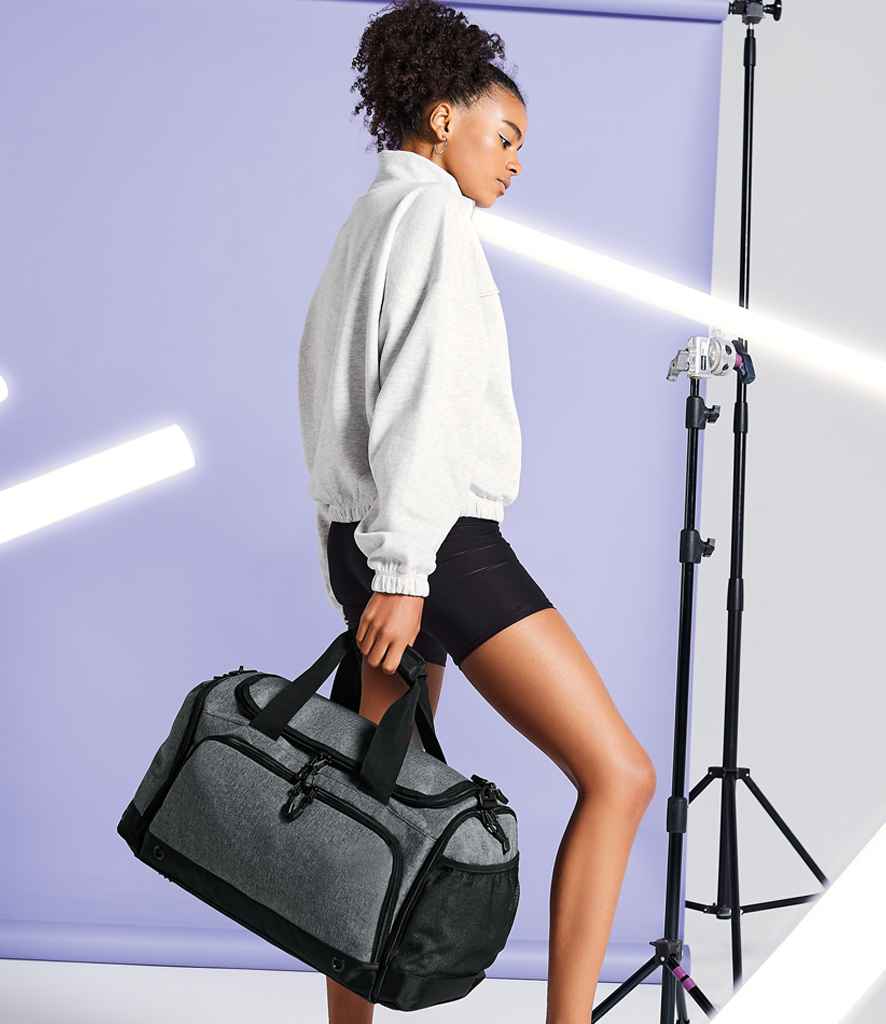BagBase Athleisure Holdall in ONE Grey Marl by Bagbase — Custom branded clothing by Print Press, featuring premium embroidery produced in our specialist print lab in the UK.