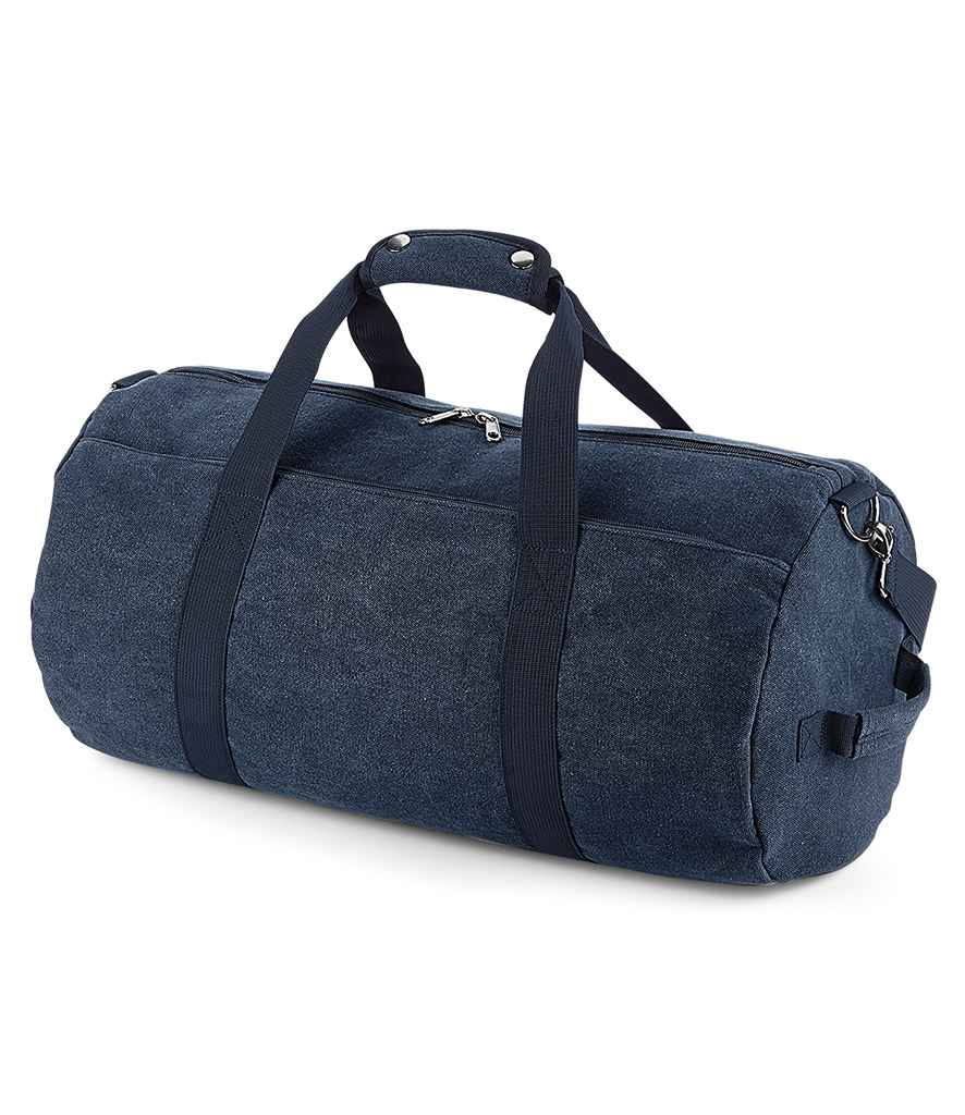 BagBase Vintage Canvas Barrel Bag in ONE Vintage Oxford Navy by Bagbase — Custom branded clothing by Print Press, featuring premium embroidery produced in our specialist print lab in the UK.