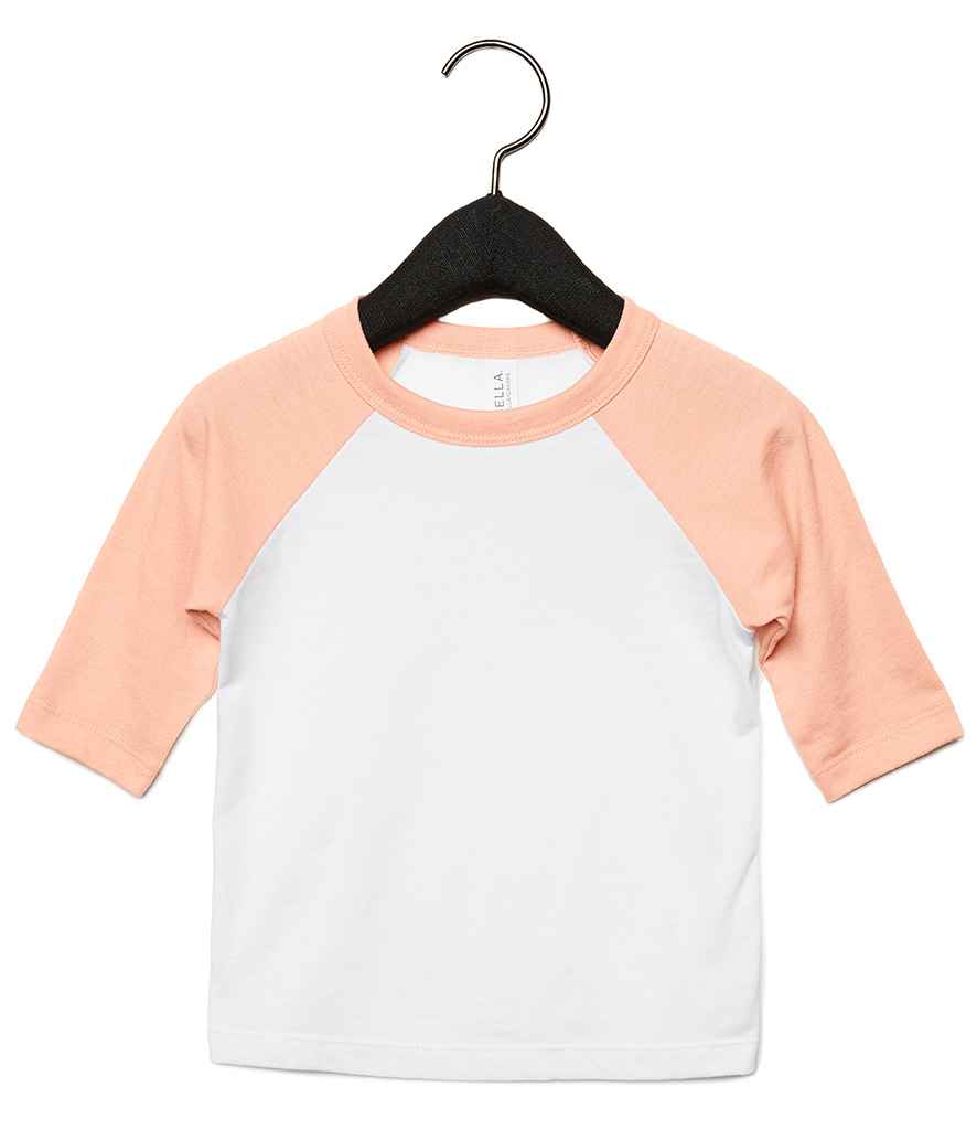 Canvas Toddler 3/4 Sleeve Baseball T-Shirt in White Heather Peach by Bella+Canvas — Custom branded clothing by Print Press, featuring premium embroidery produced in our specialist print lab in the UK.