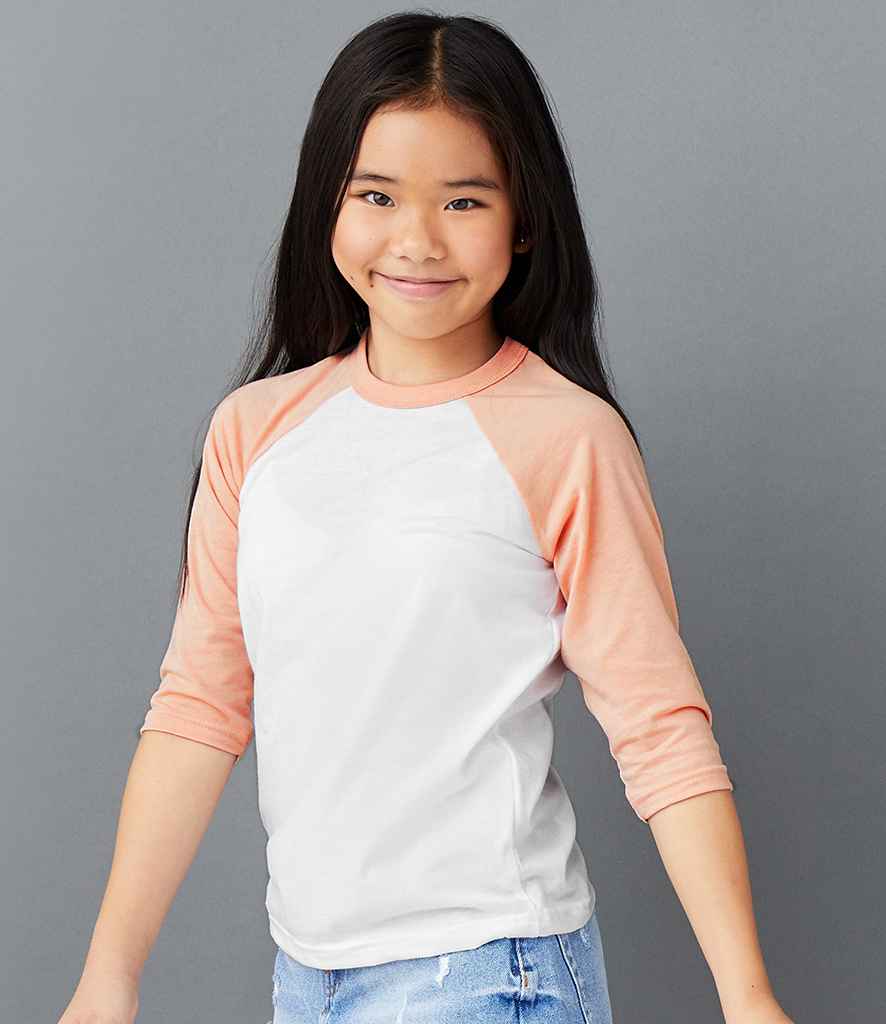 Canvas Youths 3/4 Sleeve Baseball T-Shirt in White Heather Peach by Bella+Canvas — Custom branded clothing by Print Press, featuring premium embroidery produced in our specialist print lab in the UK.