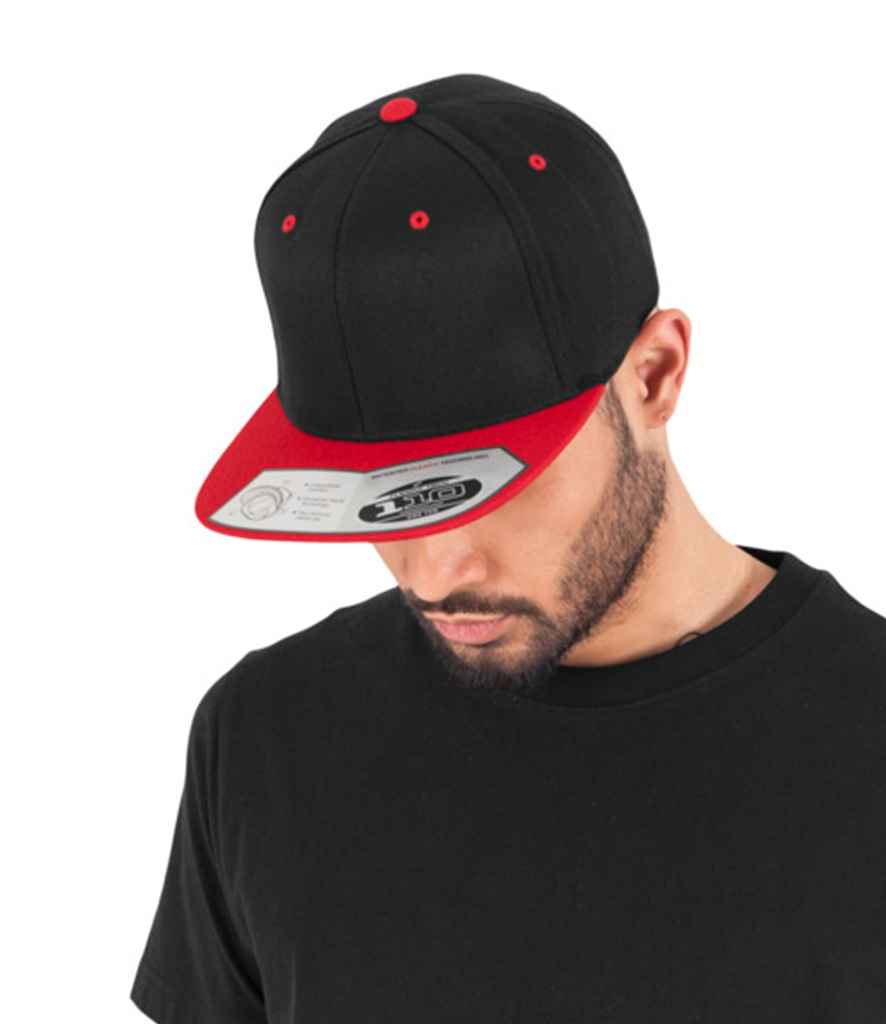 Flexfit Fitted Snapback Cap in ONE Black Red by Flexfit — Custom branded clothing by Print Press, featuring premium embroidery produced in our specialist print lab in the UK.
