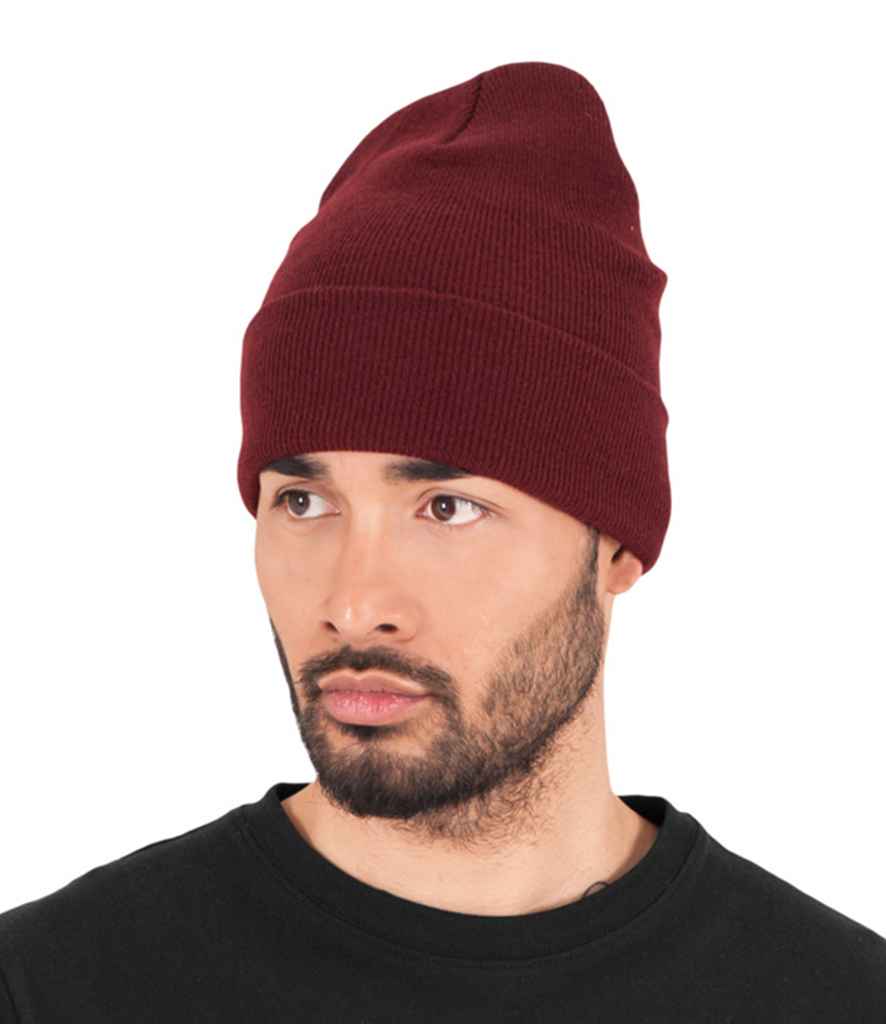Flexfit Heavyweight Long Beanie in ONE Maroon by Flexfit — Custom branded clothing by Print Press, featuring premium embroidery produced in our specialist print lab in the UK.