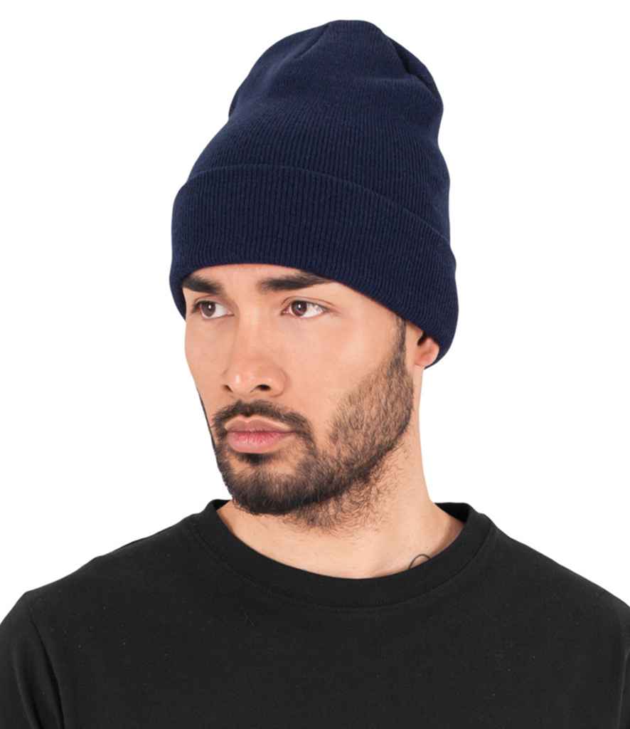 Flexfit Heavyweight Long Beanie in ONE Navy by Flexfit — Custom branded clothing by Print Press, featuring premium embroidery produced in our specialist print lab in the UK.