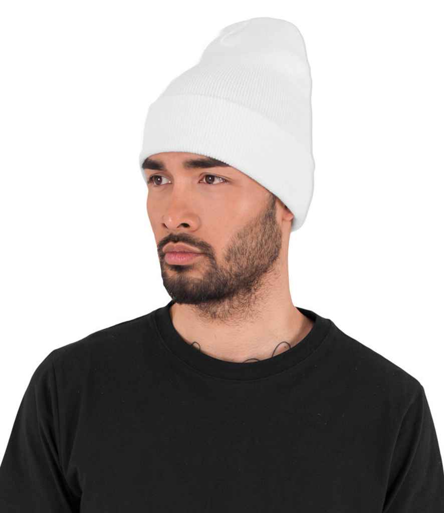 Flexfit Heavyweight Long Beanie in ONE White by Flexfit — Custom branded clothing by Print Press, featuring premium embroidery produced in our specialist print lab in the UK.