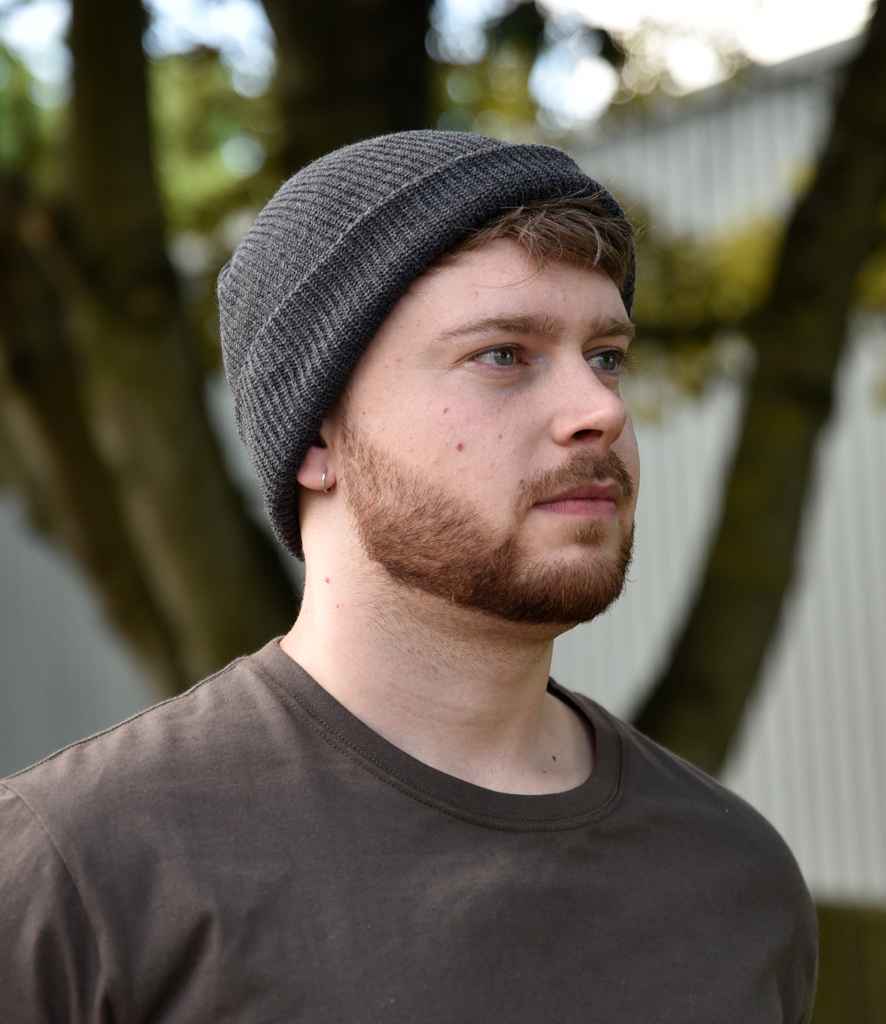 Flexfit Long Knit Beanie in ONE Dark Grey by Flexfit — Custom branded clothing by Print Press, featuring premium embroidery produced in our specialist print lab in the UK.
