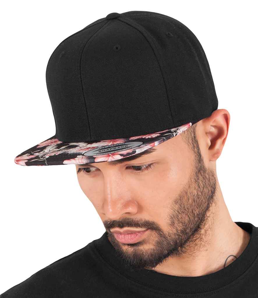Flexfit Floral Snapback Cap in ONE Red by Flexfit — Custom branded clothing by Print Press, featuring premium embroidery produced in our specialist print lab in the UK.