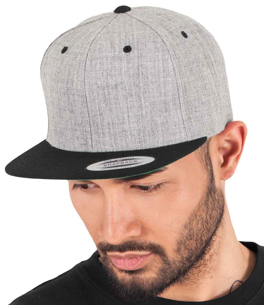 Flexfit Two Tone Classic Snapback Cap in ONE Heather Grey Black by Flexfit — Custom branded clothing by Print Press, featuring premium embroidery produced in our specialist print lab in the UK.