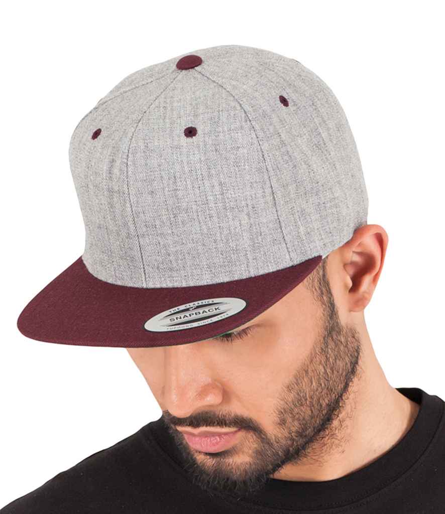 Flexfit Two Tone Classic Snapback Cap in ONE Heather Grey Maroon by Flexfit — Custom branded clothing by Print Press, featuring premium embroidery produced in our specialist print lab in the UK.