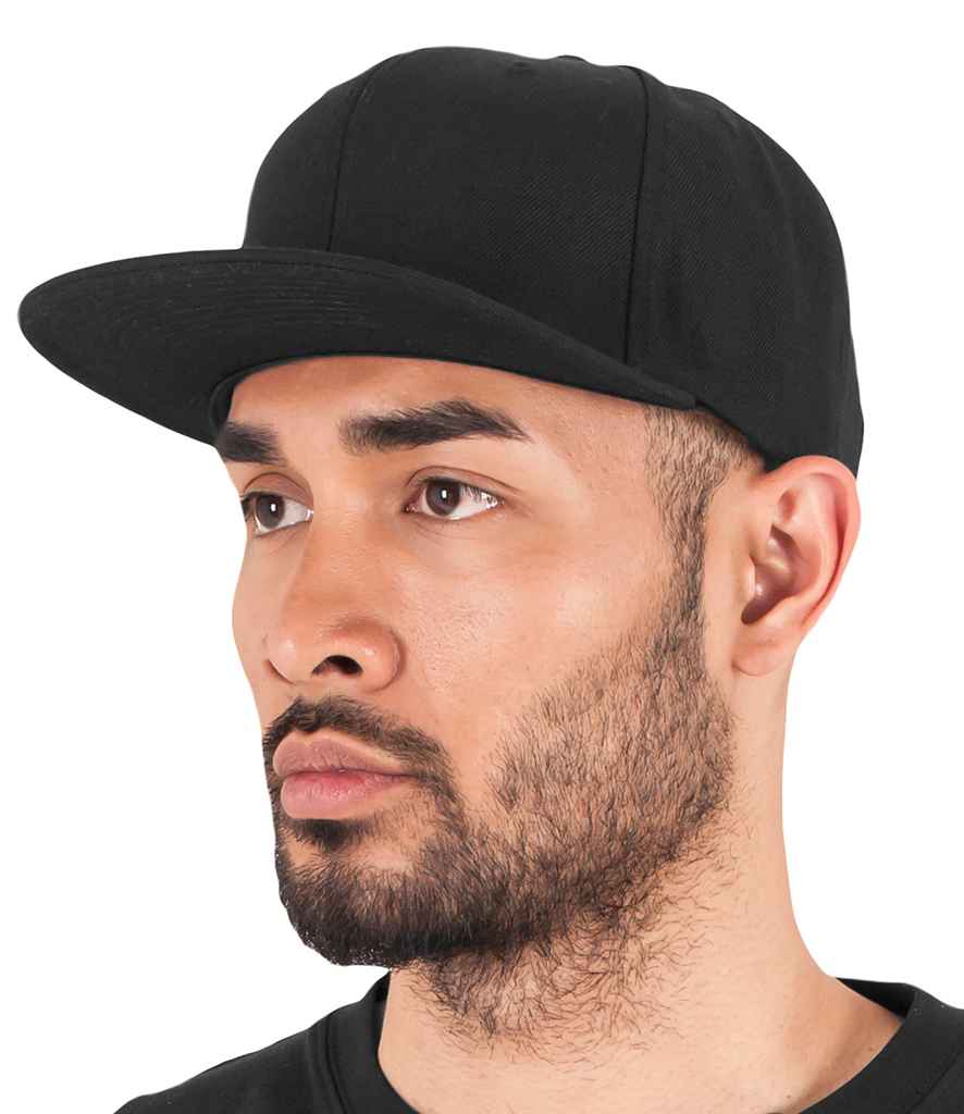 Flexfit Classic Snapback Cap in ONE Black Black by Flexfit — Custom branded clothing by Print Press, featuring premium embroidery produced in our specialist print lab in the UK.