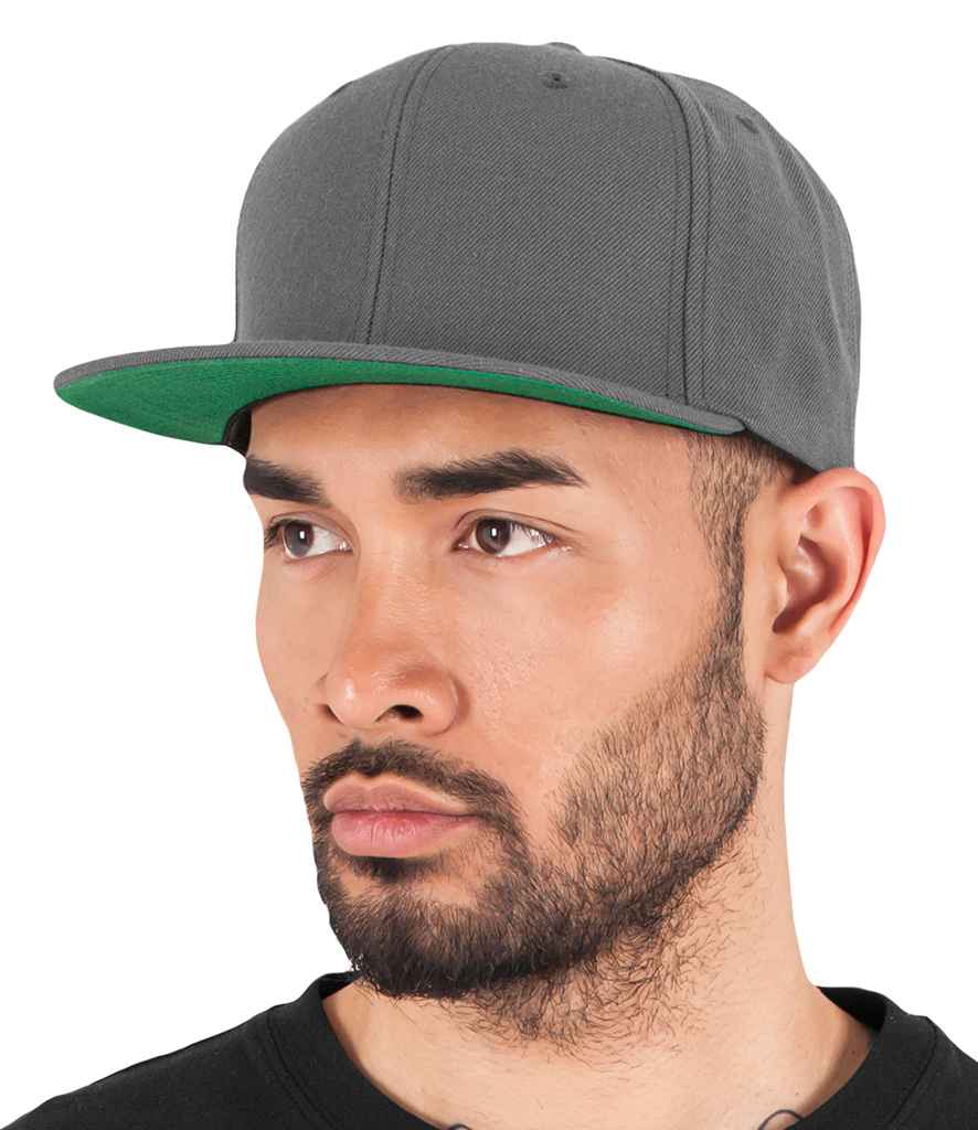 Flexfit Classic Snapback Cap in ONE Dark Grey by Flexfit — Custom branded clothing by Print Press, featuring premium embroidery produced in our specialist print lab in the UK.