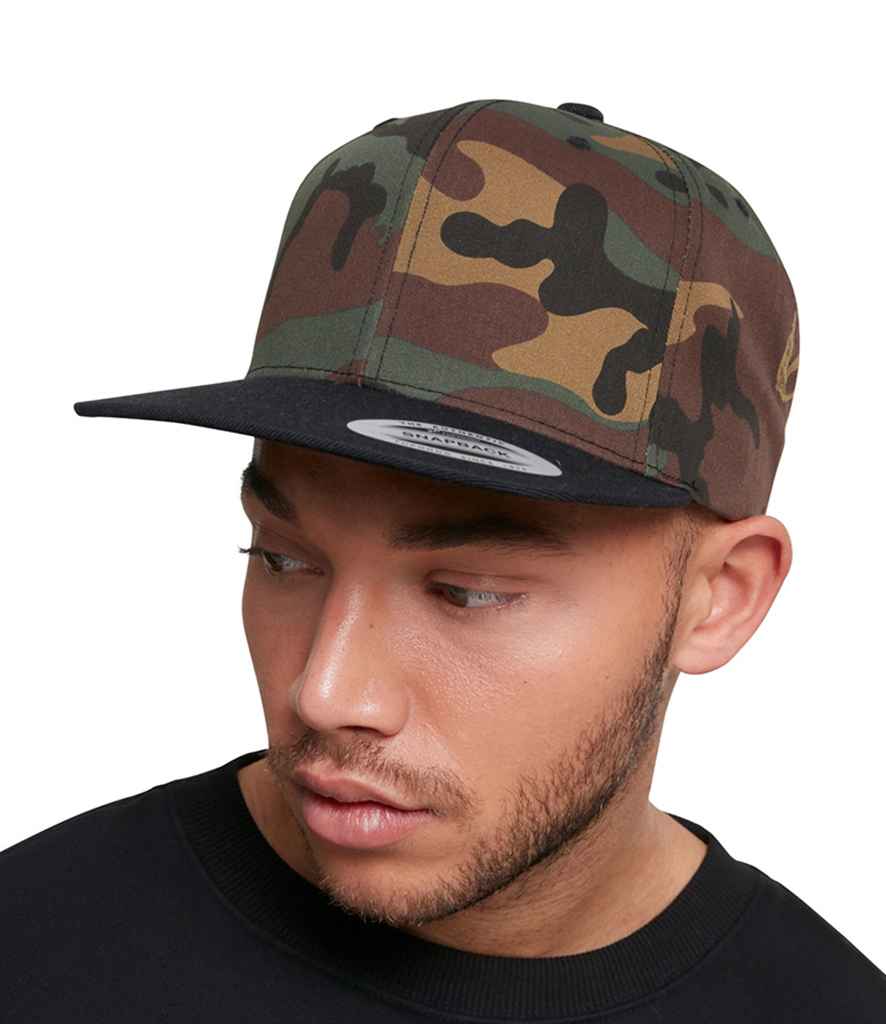 Flexfit Two Tone Classic Camo Snapback Cap in ONE Green Camo Black by Flexfit — Custom branded clothing by Print Press, featuring premium embroidery produced in our specialist print lab in the UK.