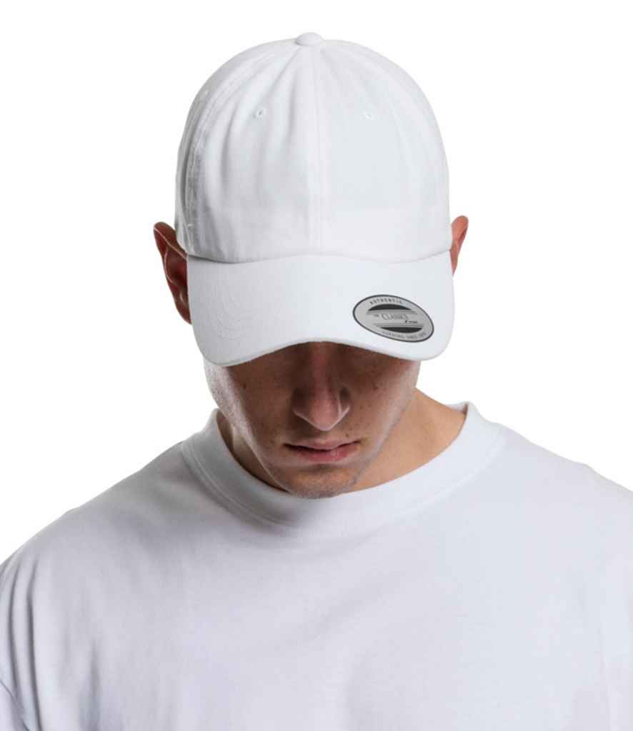 Flexfit Low Profile Cotton Twill Cap in ONE White by Flexfit — Custom branded clothing by Print Press, featuring premium embroidery produced in our specialist print lab in the UK.
