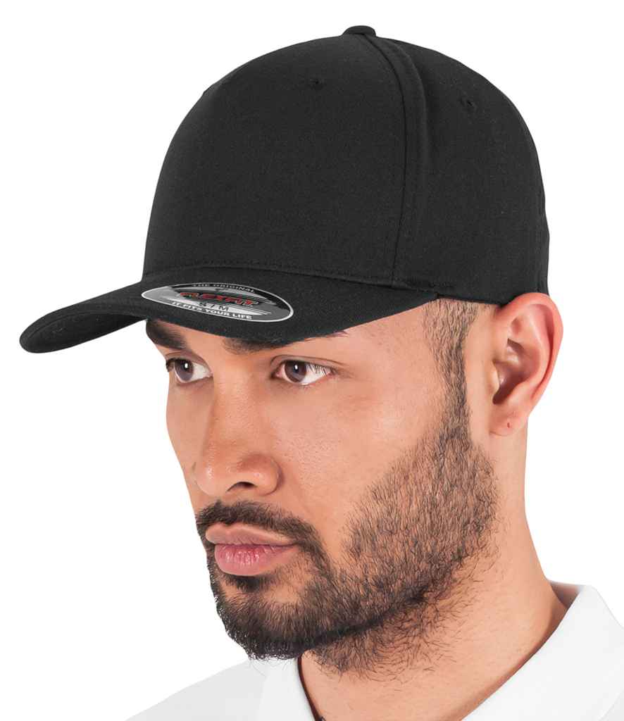 Flexfit 5 Panel Cap in Black by Flexfit — Custom branded clothing by Print Press, featuring premium embroidery produced in our specialist print lab in the UK.