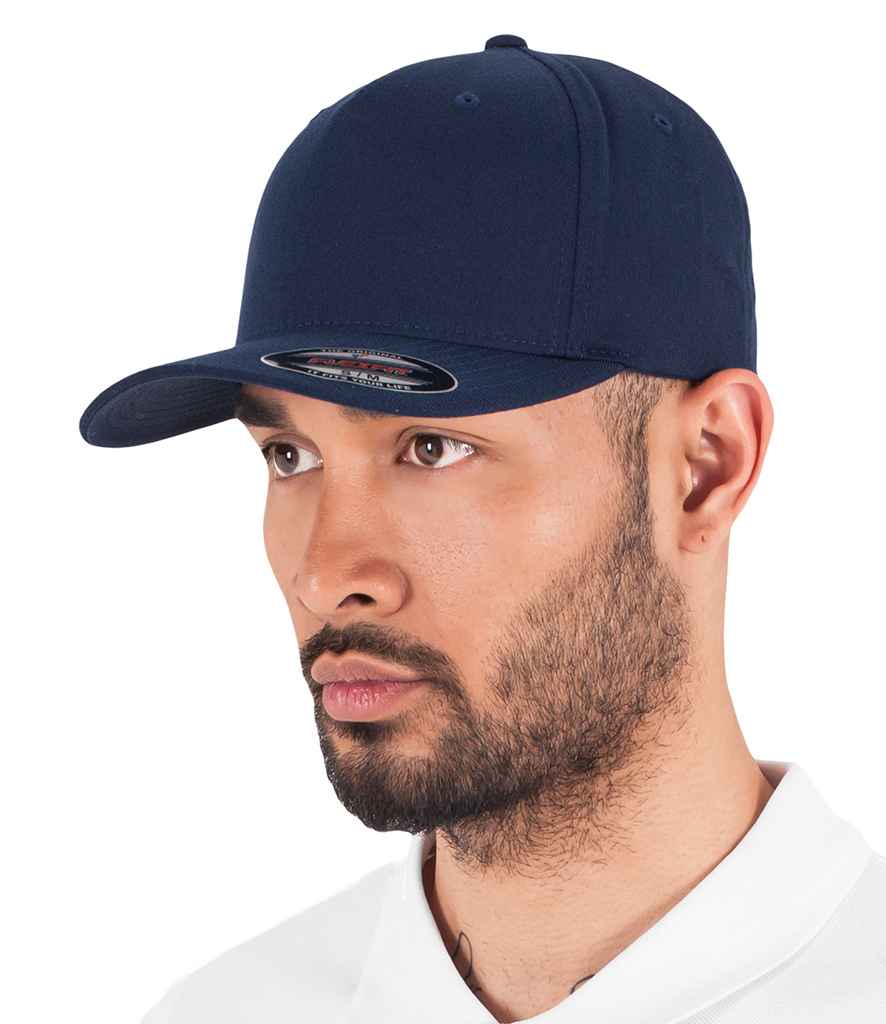 Flexfit 5 Panel Cap in Navy by Flexfit — Custom branded clothing by Print Press, featuring premium embroidery produced in our specialist print lab in the UK.