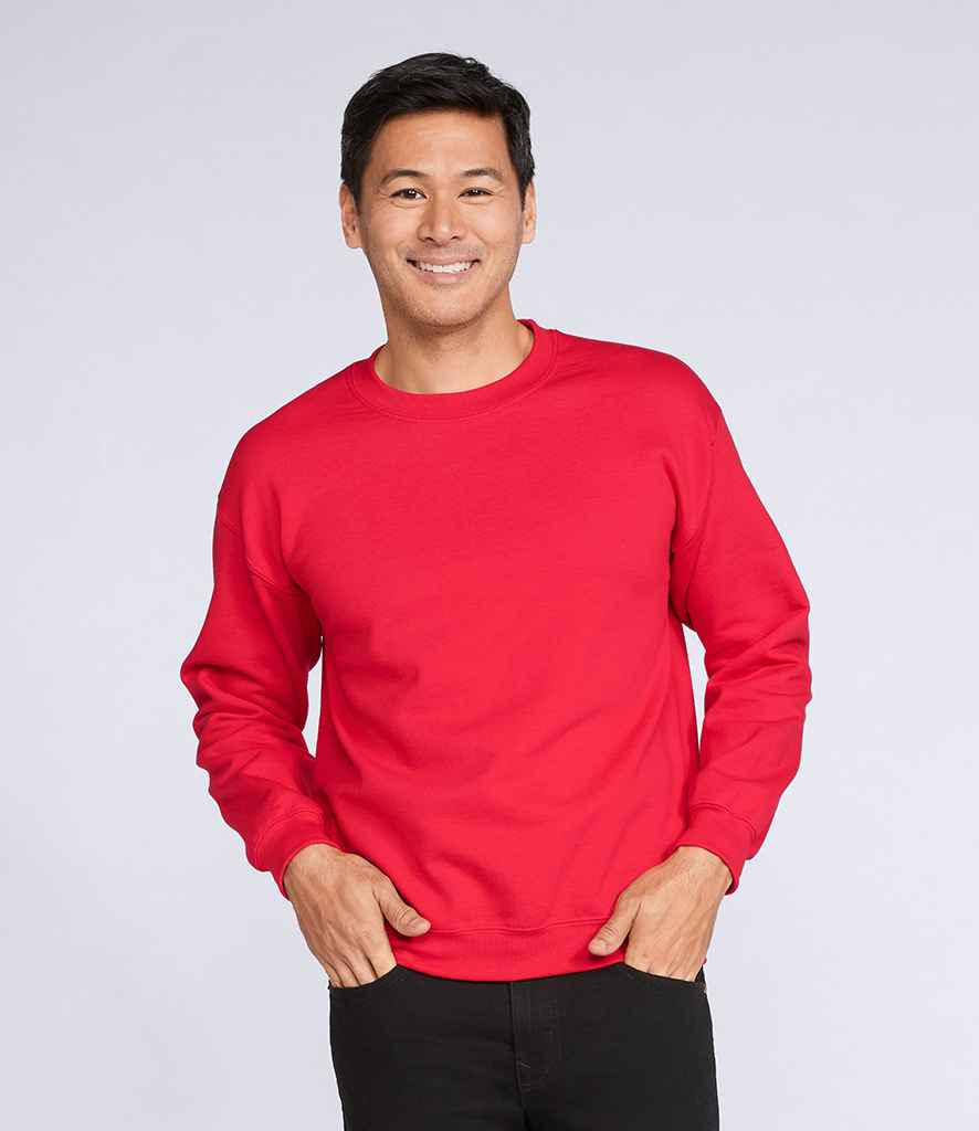 Gildan Heavy Blend Sweatshirt in Red by Gildan — Custom branded clothing by Print Press, featuring premium embroidery produced in our specialist print lab in the UK.