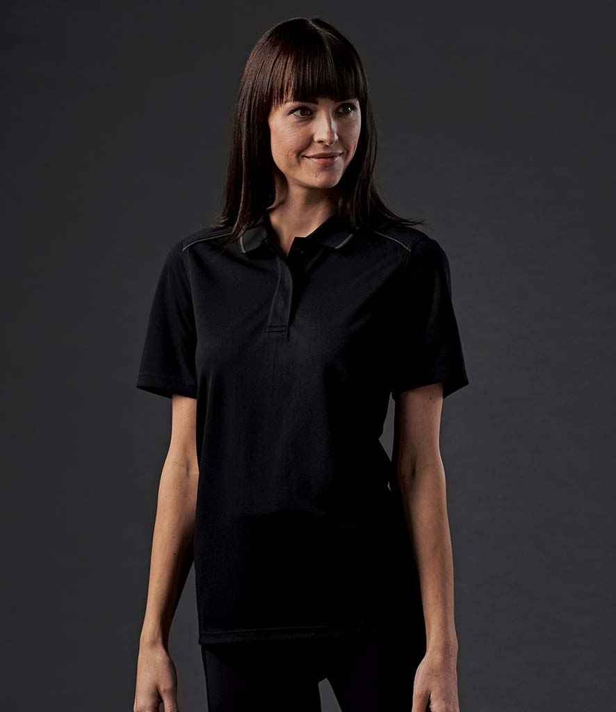 Stormtech Ladies Endurance HD Polo Shirt in Black Dolphin by Stormtech — Custom branded clothing by Print Press, featuring premium embroidery produced in our specialist print lab in the UK.