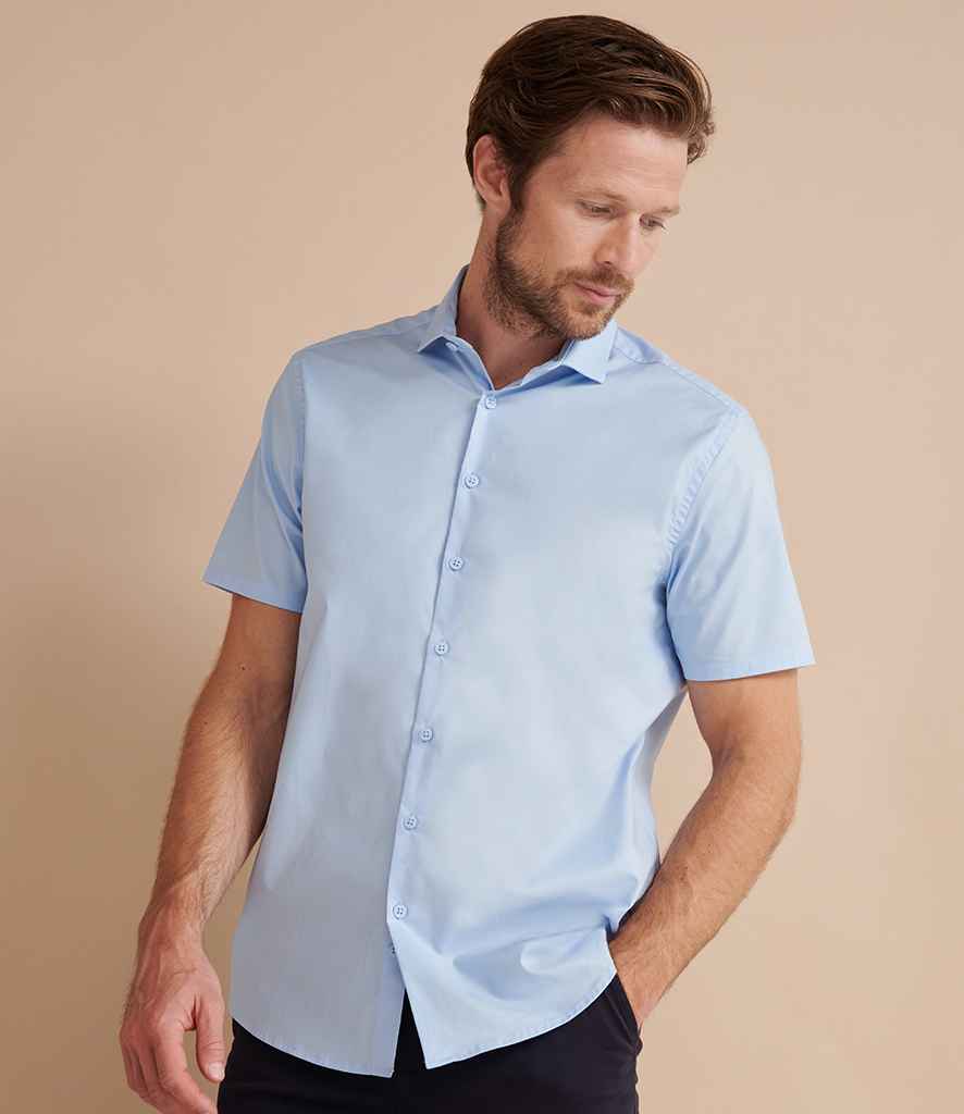 Henbury Short Sleeve Stretch Poplin Shirt in Light Blue by Henbury — Custom branded clothing by Print Press, featuring premium embroidery produced in our specialist print lab in the UK.