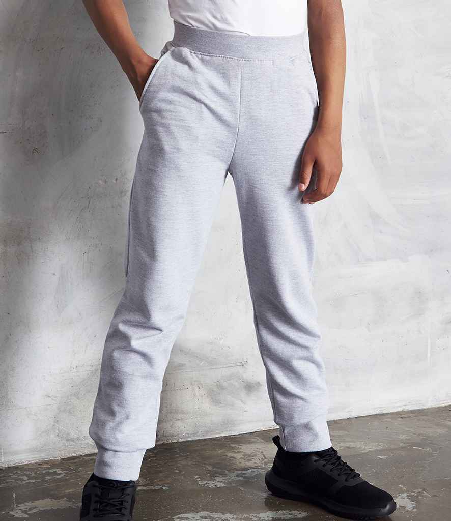 AWDis Kids Tapered Track Pants in Heather Grey by Just Hoods — Custom branded clothing by Print Press, featuring premium embroidery produced in our specialist print lab in the UK.