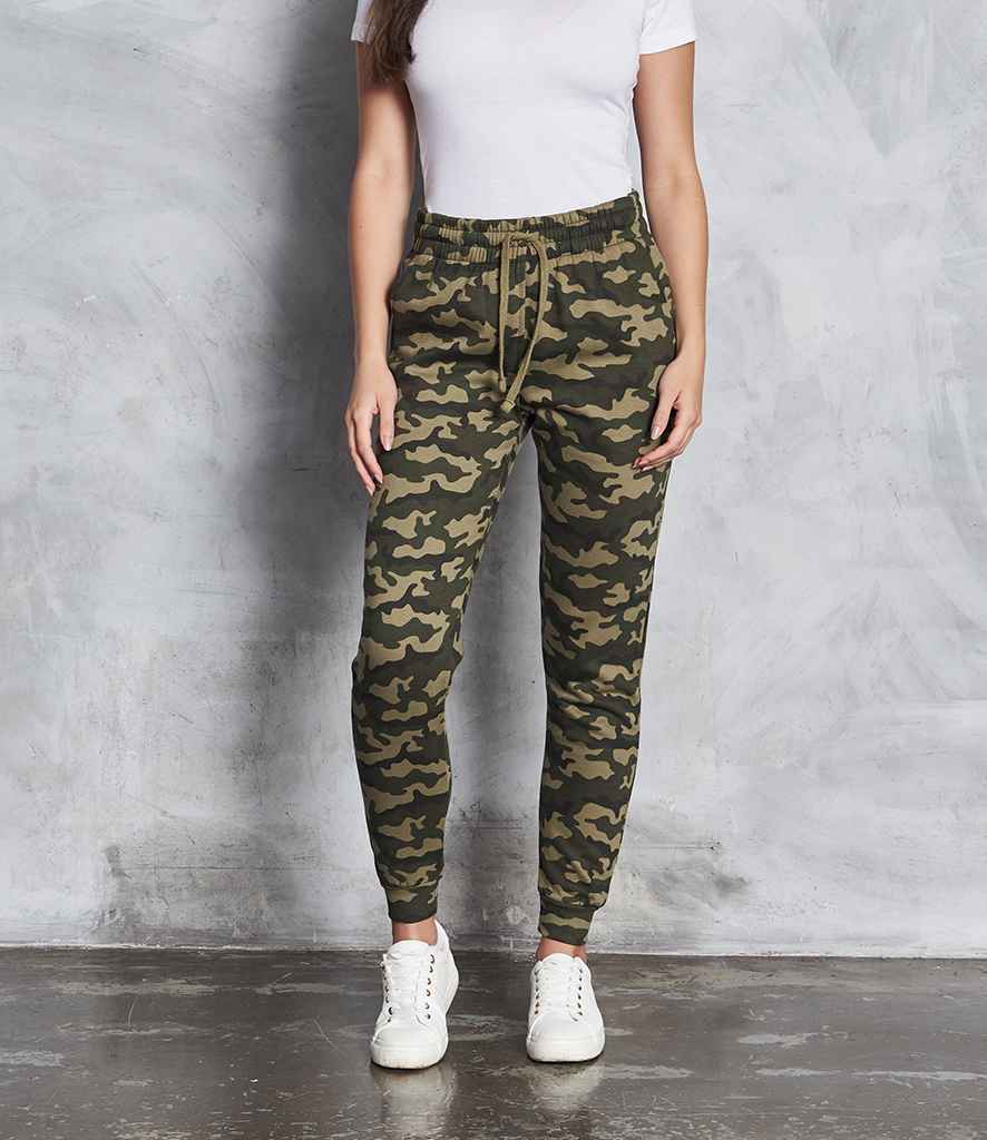 AWDis Tapered Track Pants in Green Camo by Just Hoods — Custom branded clothing by Print Press, featuring premium embroidery produced in our specialist print lab in the UK.