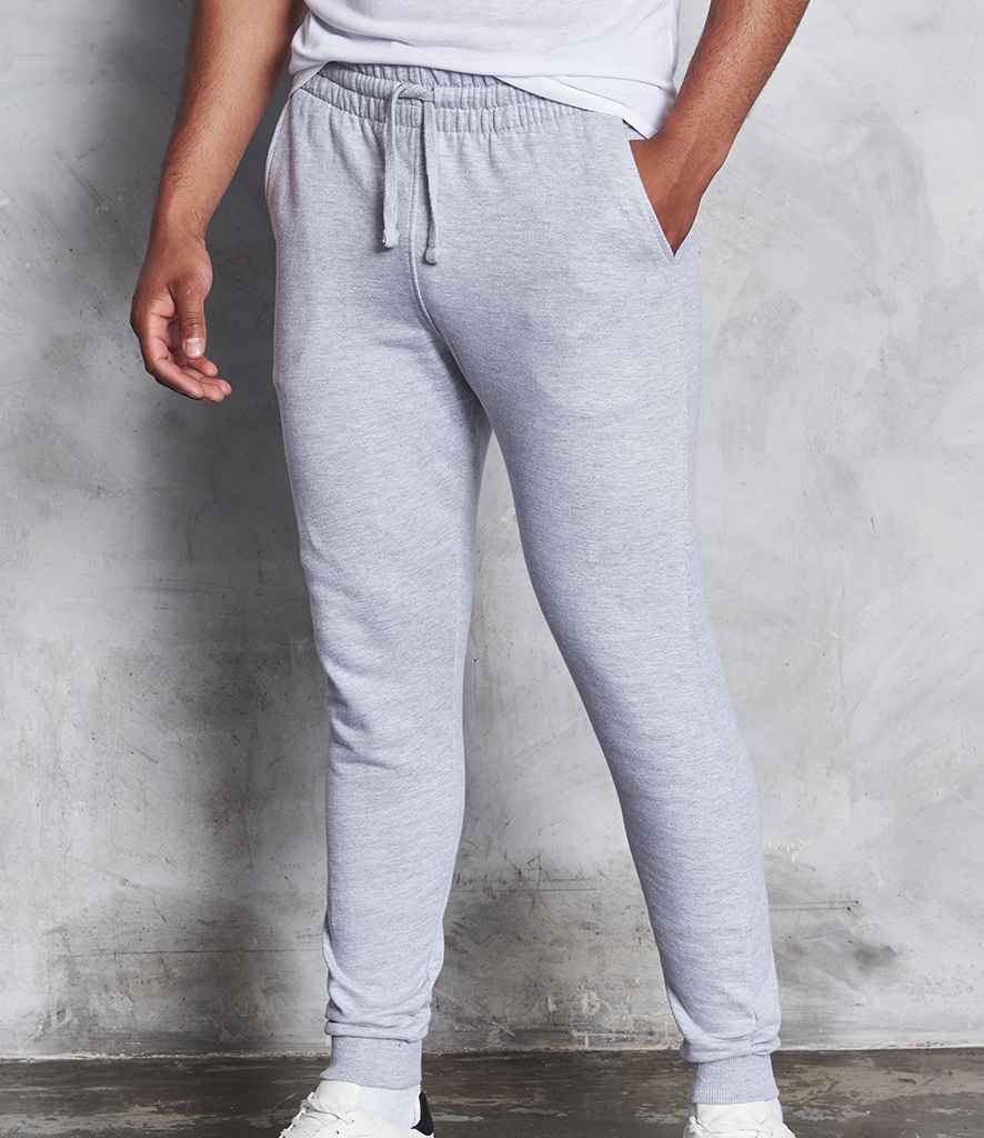 AWDis Tapered Track Pants in Heather Grey by Just Hoods — Custom branded clothing by Print Press, featuring premium embroidery produced in our specialist print lab in the UK.
