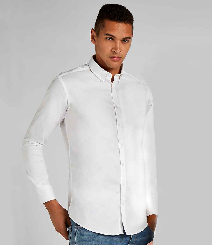 Kustom Kit Slim Fit Stretch Long Sleeve Oxford Shirt in White by Kustom Kit — Custom branded clothing by Print Press, featuring premium embroidery produced in our specialist print lab in the UK.
