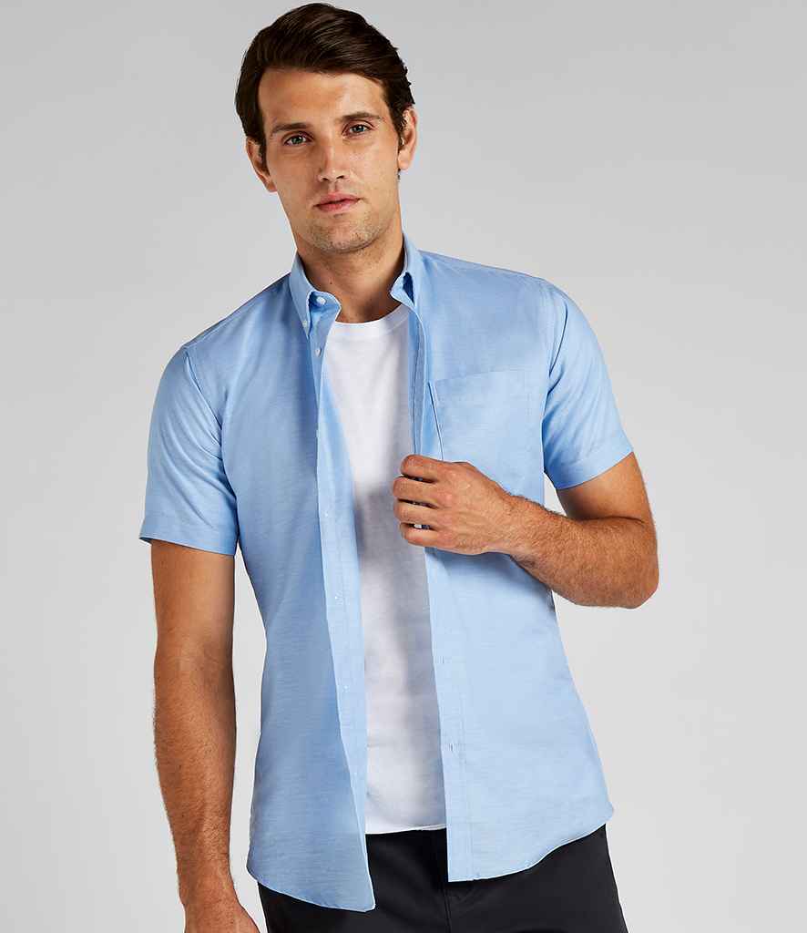 Kustom Kit Short Sleeve Slim Fit Oxford Shirt in Light Blue by Kustom Kit — Custom branded clothing by Print Press, featuring premium embroidery produced in our specialist print lab in the UK.