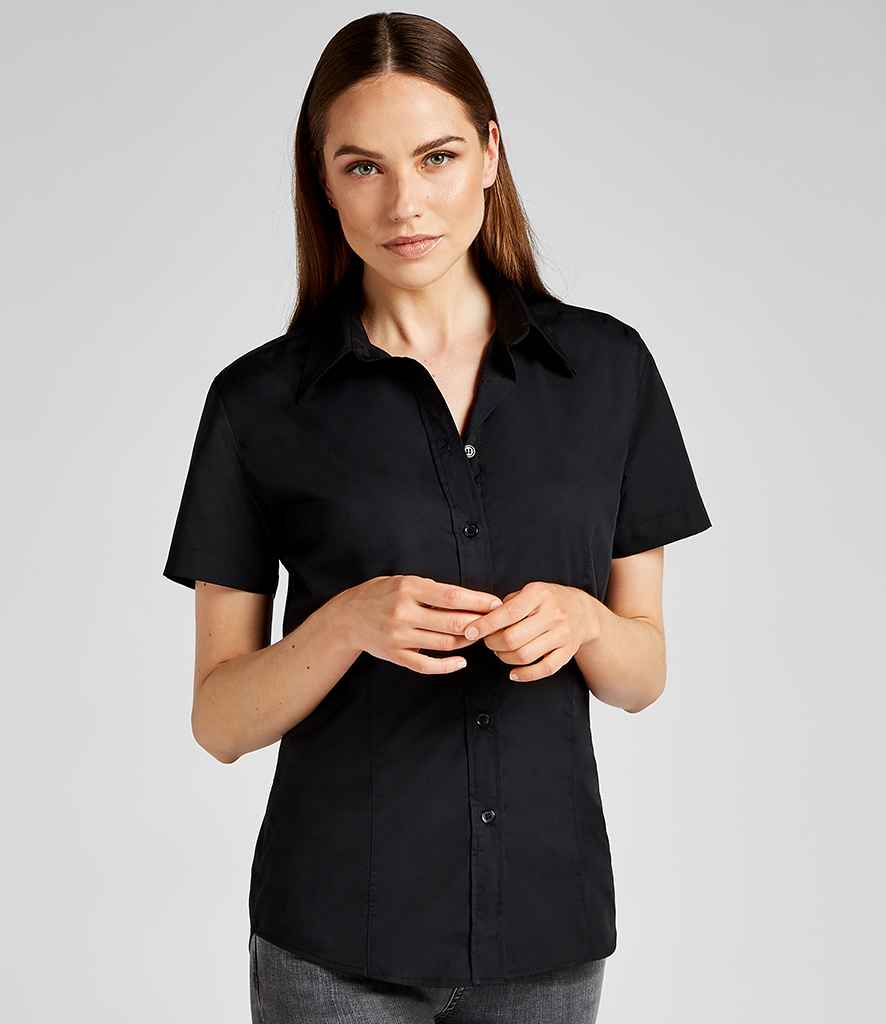 Kustom Kit Ladies Short Sleeve Classic Fit Workforce Shirt in Black by Kustom Kit — Custom branded clothing by Print Press, featuring premium embroidery produced in our specialist print lab in the UK.