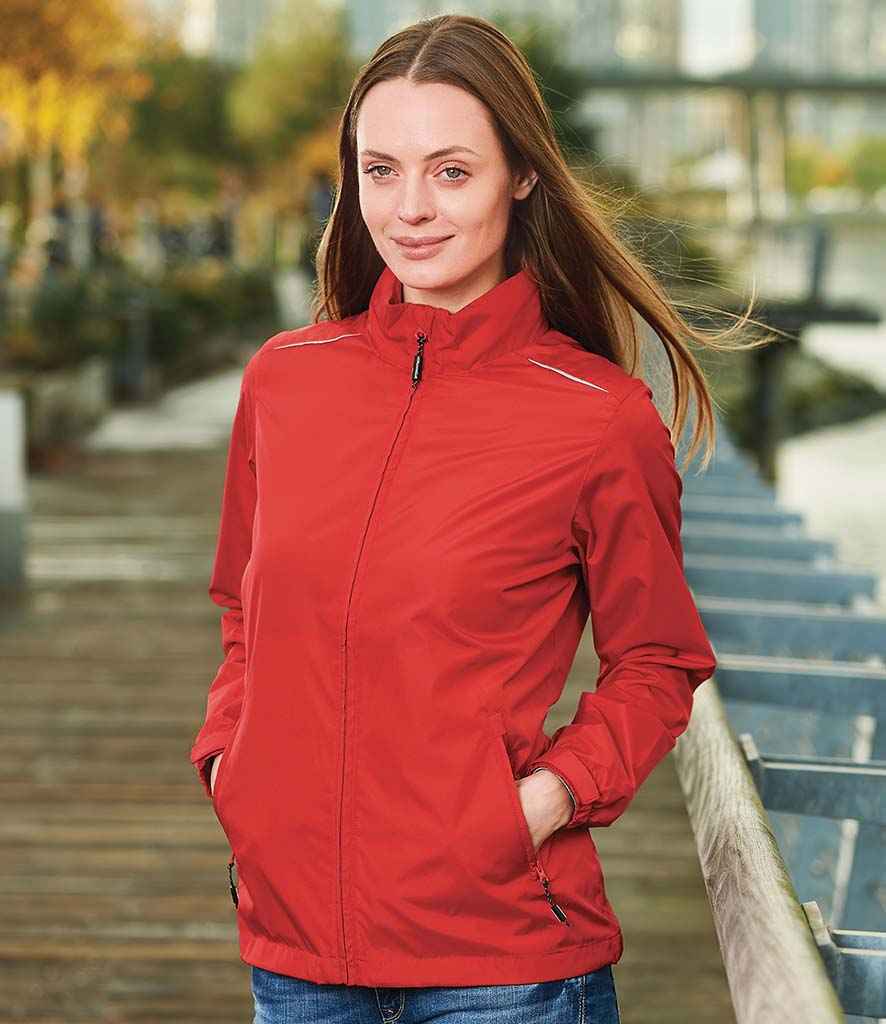 Stormtech Ladies Nautilus Performance Shell Jacket in Bright Red by Stormtech — Custom branded clothing by Print Press, featuring premium embroidery produced in our specialist print lab in the UK.