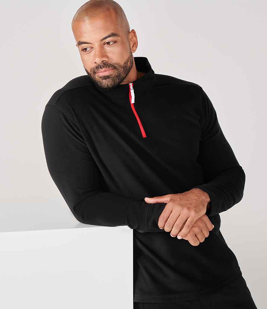Finden and Hales Zip Neck Piped Micro Fleece in by Finden + Hales — Custom branded clothing by Print Press, featuring premium embroidery produced in our specialist print lab in the UK.