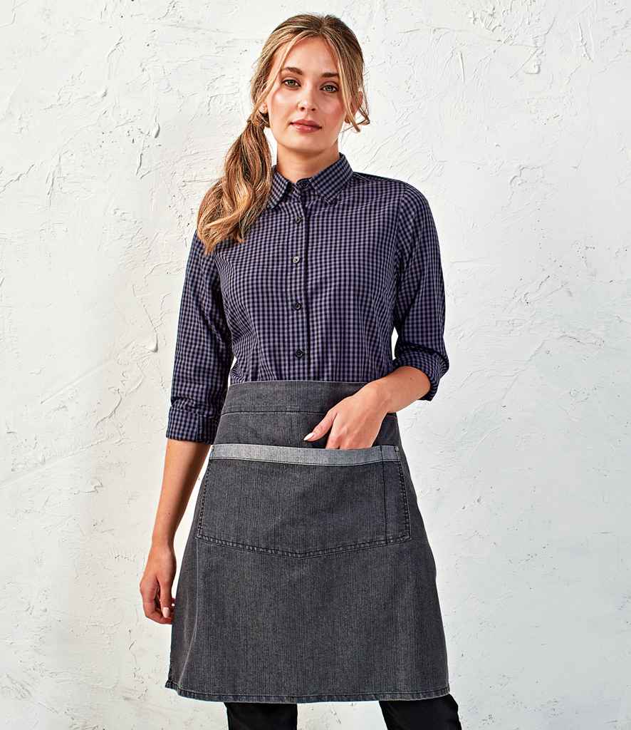 Premier Domain Waist Apron in ONE Black Denim by Premier — Custom branded clothing by Print Press, featuring premium embroidery produced in our specialist print lab in the UK.