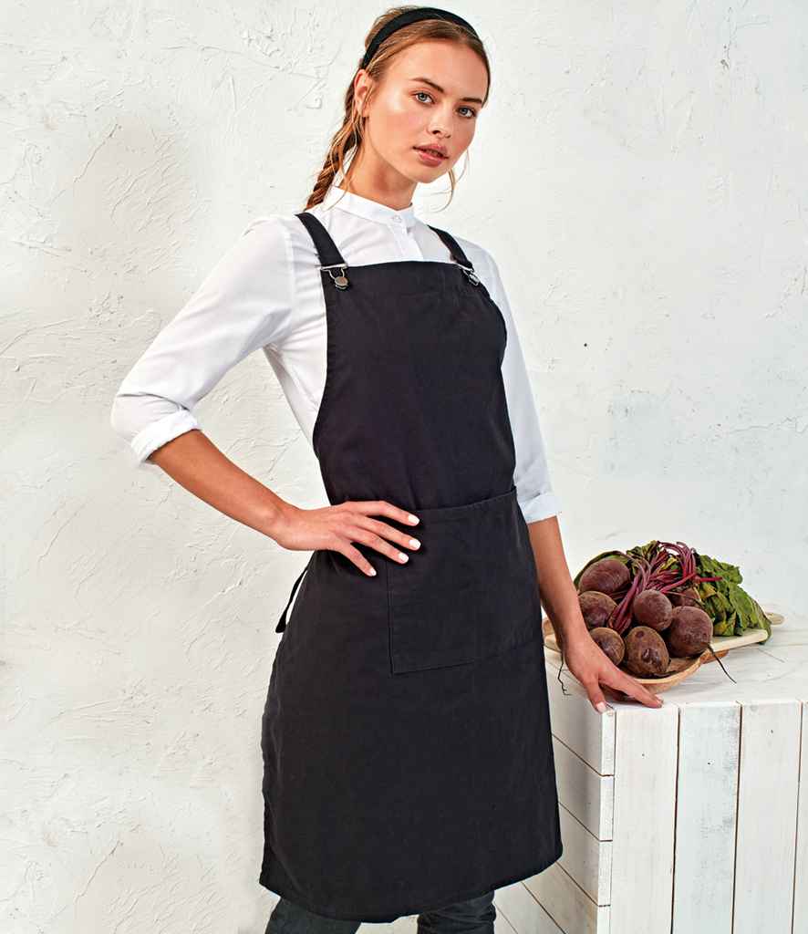 Premier Cross Back Barista Bib Apron in ONE Black by Premier — Custom branded clothing by Print Press, featuring premium embroidery produced in our specialist print lab in the UK.