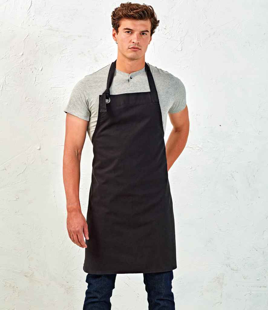 Premier Calibre Bib Apron in ONE Black by Premier — Custom branded clothing by Print Press, featuring premium embroidery produced in our specialist print lab in the UK.