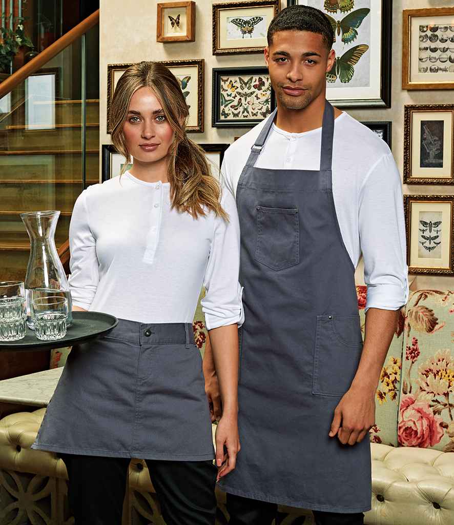 Premier Cotton Chino Bib Apron in ONE Steel by Premier — Custom branded clothing by Print Press, featuring premium embroidery produced in our specialist print lab in the UK.