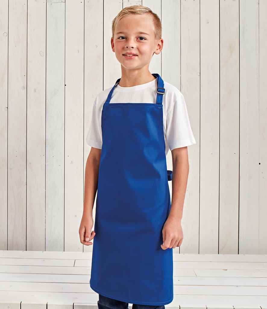 Premier Kids Bib Apron in Royal Blue by Premier — Custom branded clothing by Print Press, featuring premium embroidery produced in our specialist print lab in the UK.