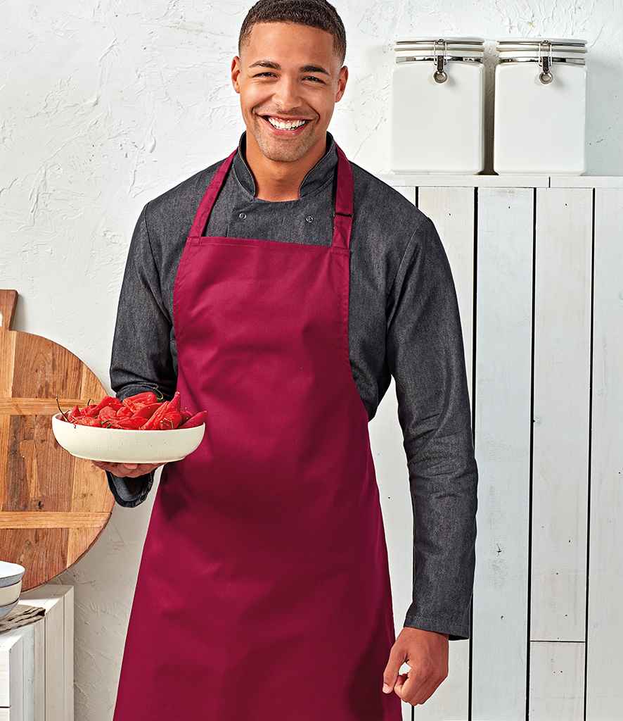 Premier 'Colours' Bib Apron in ONE Burgundy by Premier — Custom branded clothing by Print Press, featuring premium embroidery produced in our specialist print lab in the UK.