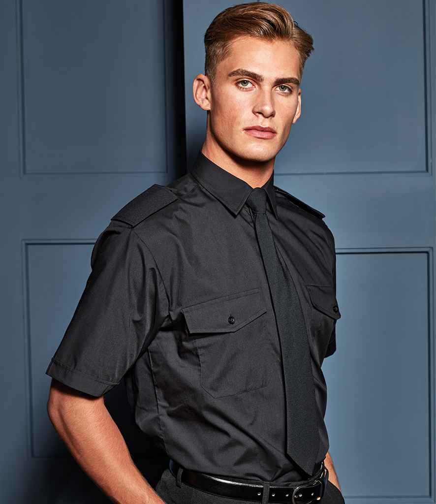 Premier Short Sleeve Pilot Shirt in Black by Premier — Custom branded clothing by Print Press, featuring premium embroidery produced in our specialist print lab in the UK.