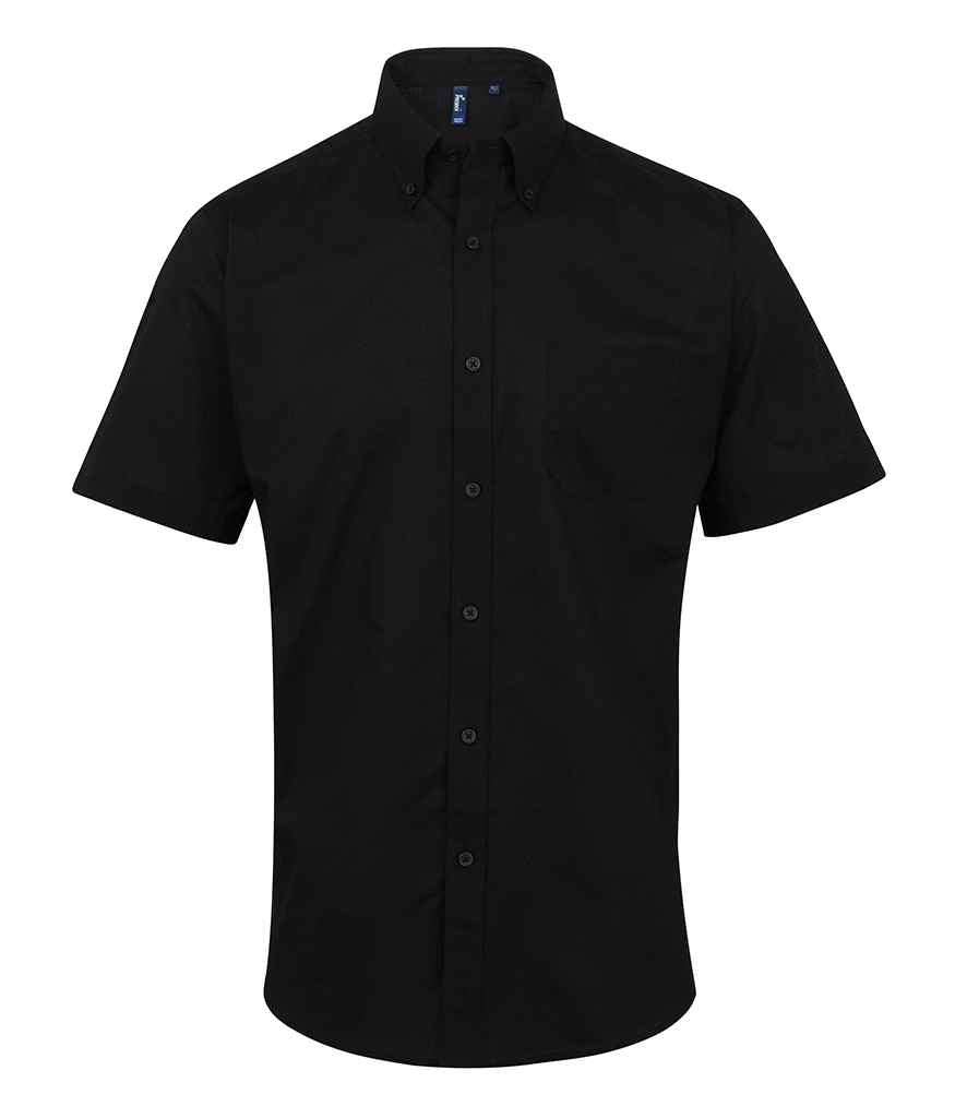 Premier Signature Short Sleeve Oxford Shirt in Black by Premier — Custom branded clothing by Print Press, featuring premium embroidery produced in our specialist print lab in the UK.