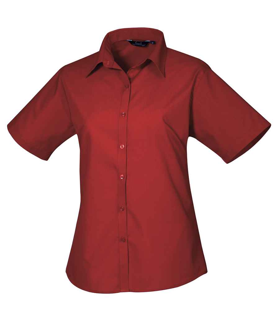 Premier Ladies Short Sleeve Poplin Blouse - (4th Colours) in by Premier — Custom branded clothing by Print Press, featuring premium embroidery produced in our specialist print lab in the UK.