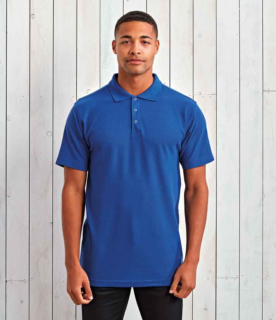 Premier Stud Pique Polo Shirt in Royal Blue by Premier — Custom branded clothing by Print Press, featuring premium embroidery produced in our specialist print lab in the UK.