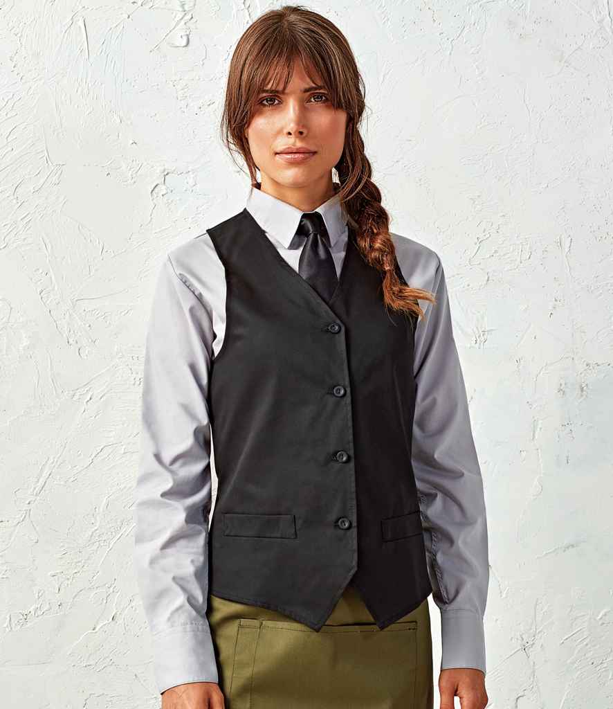Premier Ladies Hospitality Waistcoat in Black by Premier — Custom branded clothing by Print Press, featuring premium embroidery produced in our specialist print lab in the UK.