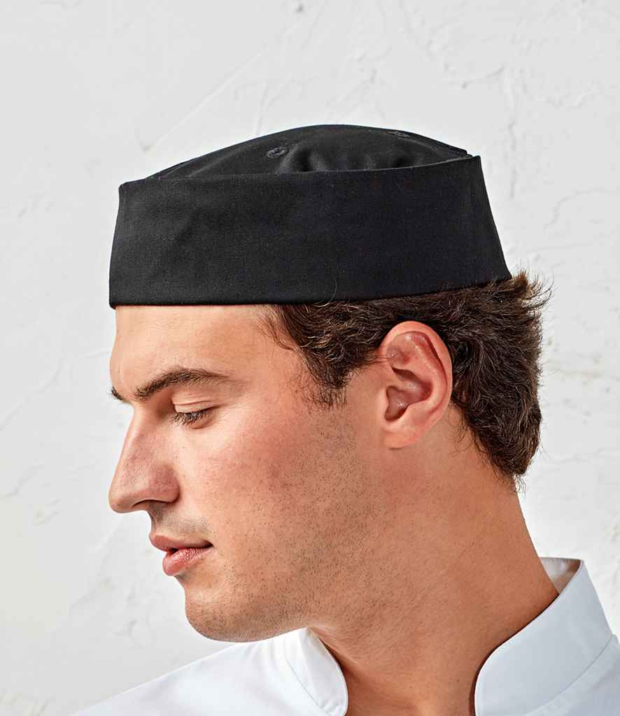 Premier Turn-Up Chef's Hat in Black by Premier — Custom branded clothing by Print Press, featuring premium embroidery produced in our specialist print lab in the UK.
