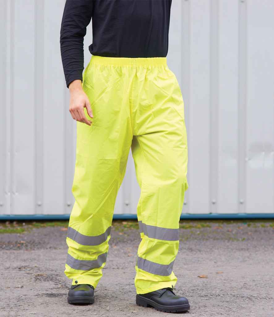 Portwest Hi-Vis Rain Trousers in Yellow by Portwest — Custom branded clothing by Print Press, featuring premium embroidery produced in our specialist print lab in the UK.